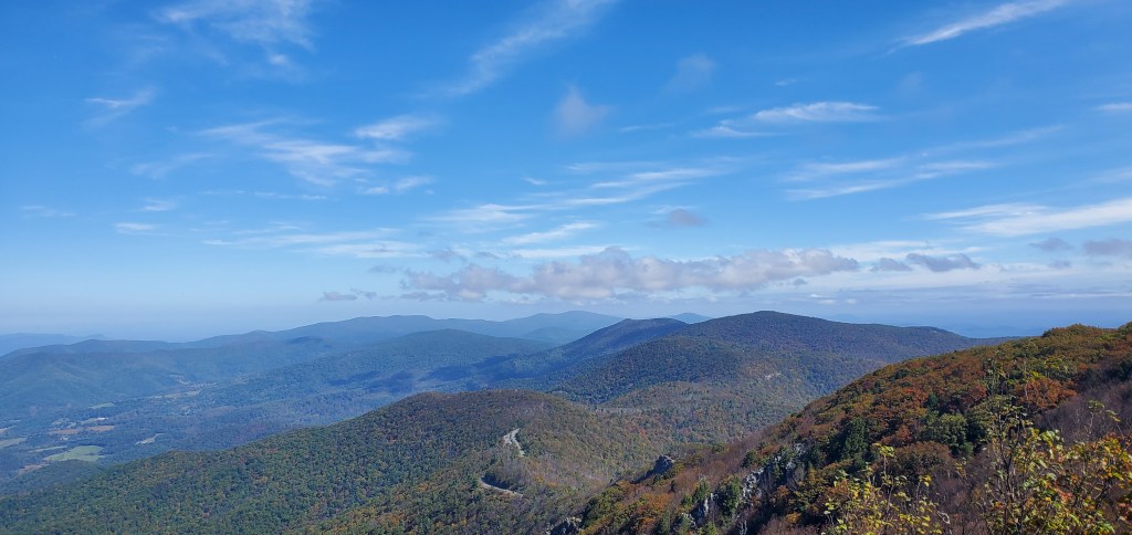 A vista of the Shenandoah National Park and Blue Ridge Mountains on a clear blue day in autumn